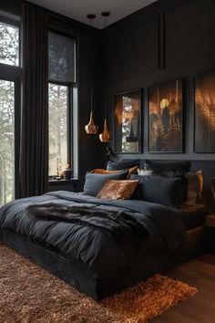 a bedroom with black walls and large windows