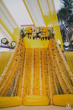 Background Haldi Ceremony Decoration Inspiration For Your Intimate Wedding | WedMeGood Flowers Indian, Indian Wedding Decorations Receptions, Mehndi Wedding, Indian Mehndi, Mehndi Party