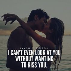 a man kissing a woman on the cheek in front of water with text that reads, i can't even look at you without wanting to kiss you