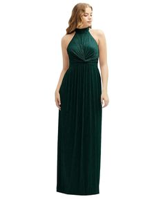 a woman in a long green dress with a halt neckline and pleaed skirt