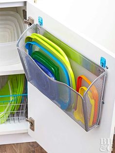 an image of a drawer full of dishes and utensils on the appliance