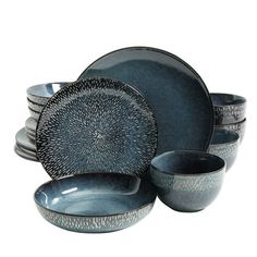 a set of blue dishes and bowls on a white background