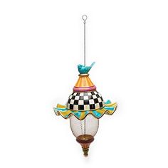 a colorful bird feeder hanging from the ceiling