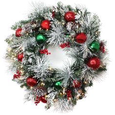 a christmas wreath with red, green and silver ornaments on white snow covered branches in front of a white background