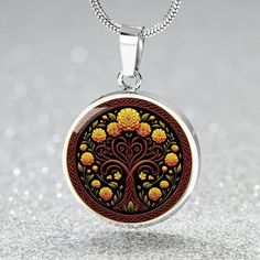 Celtic Tree of Life Necklace, a personalized piece of October birth flower jewelry featuring a Marigold charm pendant and inspired by Yggdrasil, is the perfect gift for her on Valentines Day, Mothers Day or her Birthday. ➜ Our Celtic Tree of Life Jewelry is made of high quality surgical steel with a graphic image that's printed directly onto the steel surface with a shatterproof liquid glass coating and includes an 18k gold finish option. ➜ Our Engraved Celtic Tree of Life Pendant Necklaces are Yellow Medallion Necklace As Gift, Yellow Medallion Necklace For Gift, Yellow Round Pendant Jewelry Gift, Yellow Birth Flower Jewelry For Gift, Yellow Medallion Necklace For Gifts, Nature-inspired Yellow Necklace For Gifts, Mother's Day Round Jewelry With Tree Of Life, Yellow Nature-inspired Necklace For Gifts, Mother's Day Tree Of Life Round Pendant Jewelry