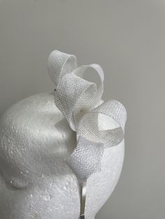 Item: White sinamay loop fascinator on a metal headband! Size: Approx. 3cms high and 3cms wide. Postage: The postage in this listing is regular post via Australia Post. Please allow approximately 7-10 days for postage at Australia Post (for metro areas) and more for regional areas.   Customise:  If you would like something added, deleted or changed, please send me a message to see if it is possible.  Postage: The postage in this listing is regular post via Australia Post. Please allow approximat Cream Fascinator, Red Orchids, Headband Size, Metal Headband, Human Head, Metal Headbands, Australia Post, Mannequin Heads, Etsy Australia