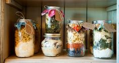 several jars filled with different types of food