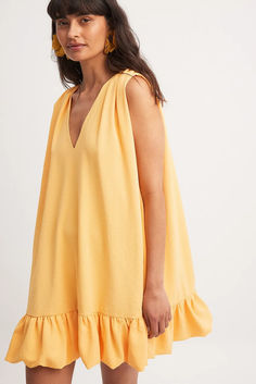 Frill Detail Sleeveless Mini Dress Summer Sleeveless V-neck Dress With Ruffles, V-neck Ruffle Hem Sundress, Ruffled Mini V-neck Dress For Vacation, V-neck Ruffled Sundress Mini Dress, Chic Yellow Sleeveless Mini Dress, V-neck Sleeveless Dress With Ruffles For Brunch, Mini V-neck Dress With Ruffles For Vacation, Vacation Mini V-neck Dress With Ruffles, Sleeveless Yellow Mini Dress With Ruffles