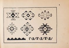 an old book with black and white designs on it's pages, including geometric shapes