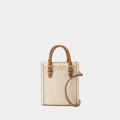 tory-burch-t-monogram-mini-shopper-bag-1727717350737742240-0 T Monogram, Canvas Leather Tote, Pennsylvania Dutch, Monogram Tote Bags, Womens Designer Handbags, Barrel Bag, Monogram Tote, Mini Tote Bag, Leather Handbags Tote