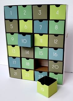 a box that has numbers on it and is in the shape of a puzzle board