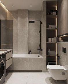 a bathroom with a washer, dryer and toilet next to the bathtub