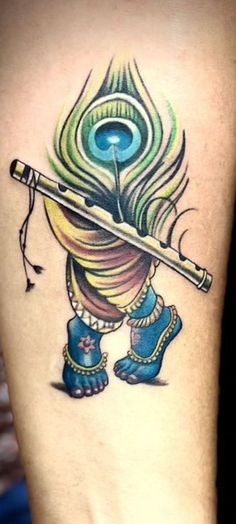 a tattoo with a peacock holding a pipe