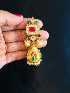 Sabyasachi Bridal Kundan Necklace/Ruby Kundan Necklace/Indian Bridal Necklace/Indian Wedding Necklace/Kundan Wedding Jewelry/Jadau Necklace Features 1-Handmade Gold Plated Indian Kundan Jewelry Necklace and Jhumka Earrings Set. 2-22 K Gold Plated Jewelry 3-Beautiful Wedding Necklace with Statement Earrings. 4-Traditional Kundan/Meenakari/Jadau Necklace Set 5-Handcrafted To Perfection 6-Unique boutique design 7- Perfect Bridal Necklace Set Dimensions: Necklace: Adjustable Fitting Earrings: Approx Jadau Necklace Set, Indian Bridal Necklace, Bridal Necklace Indian, Indian Wedding Necklace, Sabyasachi Bridal, Popular Necklaces, Wedding Necklace Set, Bridal Necklace Set, Necklace Indian