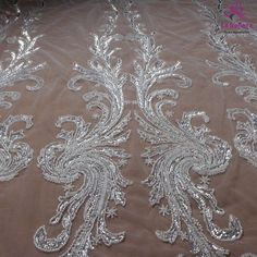 Price: The price is for 1 yard. if you buy more than 1 yard ,it won't be cut. will come in one piece the longest is 20 yards. Material: polyester,sequins,beads Fixed Wide : 100cm or 36 inches. color:silver Want to see other colors and more similar Beading lace fabrics come to: https://www.etsy.com/shop/Randyfabrics?ref=hdr_shop_menu&section_id=14192305 Shipping: Choose the shipping way you need, if you want package shipped by express,please note the phone number on order. Use for Dress,cloth Elegant Silver Embroidered Fabric For Wedding, Elegant Silver Lace With Intricate Embroidery, Elegant Silver Embroidered Fabric With Lace Work, Elegant Silver Lace Embroidered Fabric, Elegant Silver Embroidered Lace Fabric, Elegant Silver Lace Tulle Fabric, Embellished Silver Lace Tulle Fabric, Silver Embellished Lace Tulle Fabric, Elegant Silver Lace With Sequins