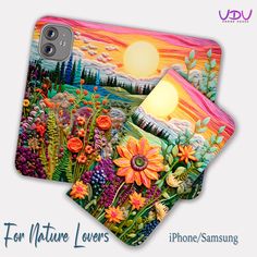 two phone cases with flowers on them and the sun setting in the sky behind them