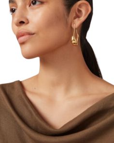 Elevate your style with Colette Hoops. Made of high quality 14k gold with a sleek, high polish finish, these hoops will be your go-to accessory for any event. The hook opening makes them easy to wear, while their elite looks are sure to elevate your confidence. A true girl's best friend, imported for your exquisite taste. Modern 14k Gold Hoop Earrings For Evening, Chic Hoop Earrings With Ear Wire For Formal Occasions, 14k Gold Hoop Earrings For Evening, Minimalist Gold-tone Hoop Earrings For Formal Occasions, Modern Hoop Earrings With French Hook, Chic 14k Gold Hoop Earrings For Formal Occasions, Minimalist Yellow Gold Hoop Earrings For Evening, Denim Sweater Jacket, Jenny Bird