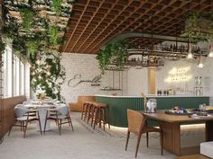 a restaurant with tables, chairs and plants growing on the wall above it's bar