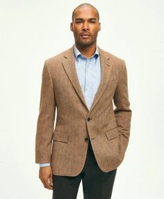 A classic piece and designer favorite, our herringbone sport coat features Italian-woven wool in neutral tones that go just as well with your oxford shirts as they do with your dress styles. Our signature attention to detail gives a natural shoulder drape, a meticulous bufferfly lining and the kind of craftsmanship you can only find here..CLASSIC FIT: Our average fit across chest, body and sleeves. (formerly known as Regent Fit).2-button; side vents; half lined; finished sleeves.100% Wool.Dry Cl Oxford Shirts, Brooks Brothers Men, Flannel Dress, Logo Knit, Wool Flannel, Mens Dress Pants, Oxford Shirt, Brooks Brothers, Dress Styles