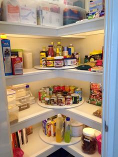 an open pantry with lots of food in it