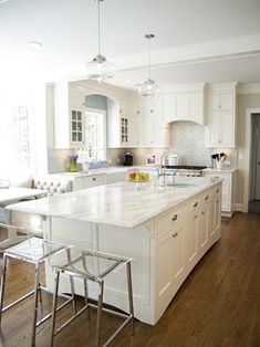 the kitchen is clean and ready to be used for cooking or eating, but not in use