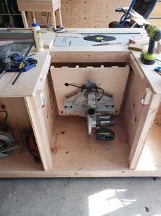 a workbench with tools and equipment in it