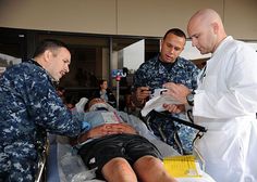 Naval Medical Center San Diego staff review patient information and injuries during the Naval Medical Center San Diego (NMCSD) command-wide simulated mass casualty drill. Job Career, United States Military, U S Navy, Career Opportunities, Part Time, Us Navy, San Diego, Health Care