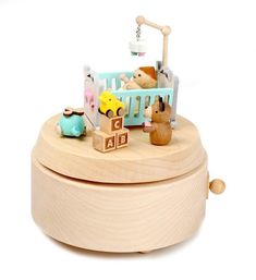 a wooden box with toys on top of it