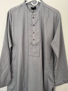 large size Straight Kurta For an elevated daily look opt for textured kurta imbued in a light grey hue. Details: Plain Front, Plain Back, Band Neck, Full Sleeves Colour: Light bluish gray Fabric: Blended Texture Fabric large chest 48" shirt length 42.5" Mens Kurta, Texture Fabric, Bluish Gray, Lawn Shirts, Straight Kurta, Gray Fabric, Colour Light, Full Sleeves, Daily Look