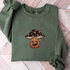 Embroidered Mushroom Pumpkin Halloween Costume Sweatshirt, Cute Fall Cottagecore Embroidery Shirt, Funny Halloween Sweater, Autumn Mushroom WELCOME TO VORYAN ! ✔️ ORDERING INSTRUCTIONS 1. Please ensure you have thoroughly read all the provided information and viewed all the photos. 2. After doing so, select your preferred shirt style, size, and color from the options available in the dropdown menu. 3. To add more items to your order, use the back button and follow the same process. 4. When you'v Cotton Fall Sweatshirt With Mushroom Print, Cotton Sweatshirt With Mushroom Print For Fall, Fall Mushroom Design Crew Neck T-shirt, Fall Crew Neck T-shirt With Mushroom Design, Fall Mushroom Print Crew Neck Sweatshirt, Halloween Embroidered Cotton Sweatshirt, Embroidered Cotton Sweatshirt For Halloween, Cotton T-shirt With Mushroom Design For Fall, Mushroom Clothes