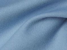 a close up view of a blue fabric