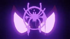 a purple spider logo is shown in the dark