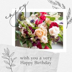 a happy birthday card with an image of flowers and greenery on the bottom right corner