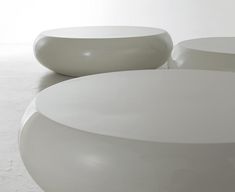 three large white bowls sitting next to each other