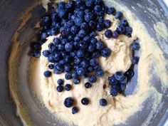 blueberries are mixed together in a bowl to make mashed potatoes for the dish