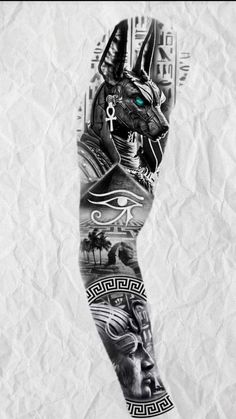 an egyptian cat tattoo on the left arm and leg, in black and white with blue eyes