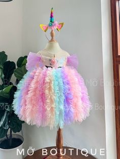 "Enchanting Baby Unicorn Sequin Tutu: Sparkling Birthday & Prom Dress for Your Little Princess in Unicorn Theme" SIZE: Newborn to 5Y (Please check our Sizing Picture for more details) Your Purchase will include The Baby/Kid Dress and a FREE Headband as Our Gift for your Princess   --------------------------------------------------------------------------------------------------------- HIGHLIGHTS: Handmade, Sequin, Tulle and Mesh Fabric, Lace, Back Bow, Multi Layers.  Sleeves: Puff and Off-the-sh Unicorn Dresses For Kids, Twin Halloween, Kid Dress, Festive Dress, Green Prom, Unicorn Dress, Theme Dress, Unicorn Theme, Baby Unicorn