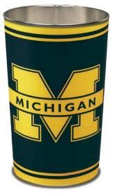 the michigan wolverines logo on a black and yellow cup