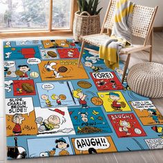 a rug with cartoon characters on it in front of a chair and potted plant