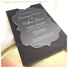 an elegant black and silver wedding card