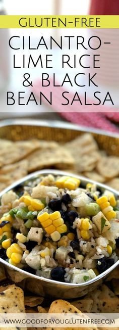 a close up of a bowl of food with crackers on the side and text overlay reading gluten - free cilantro lime rice & black bean salsa