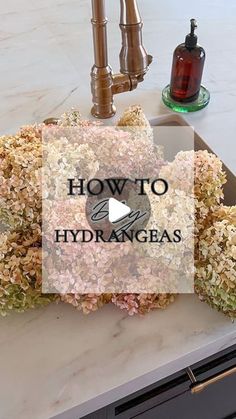 a kitchen counter with flowers on it and the words how to dry hydrangeas