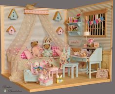 there is a doll house with furniture and accessories in the room, including teddy bears