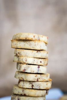 a stack of cookies sitting on top of a blue plate