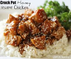 a white plate topped with rice and chicken