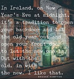 an old house with a bicycle parked outside it and the words in ireland, on new year's eve at midnight