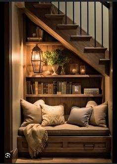 the stairs are lined with books and pillows