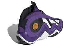 a purple and white basketball shoe on a white background