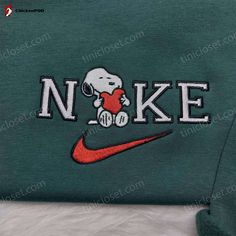 Snoopy Heart Nike Shirt: Custom Embroidered Sweatshirt - Best Valentine s Day Gifts Custom Nike Sweatshirt Iron On, Nike Custom Sweatshirts, Nike Embroidery Sweatshirt, Custom Nike Sweatshirt, Popular Sweatshirts, Heart Nike, Snoopy Clothes, Embroidery Sweaters, Baseball Things