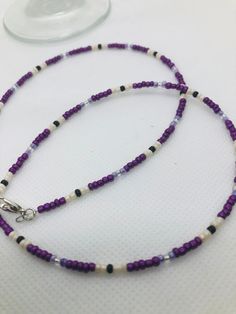 "This beadwork project is a design that is made on Accuflex beading wire. It measures 20\". It is not stretchy.  If you would like this necklace done in a different size or colors, let me know and I'll set up a listing for that.  You are purchasing this actual beaded necklace. Let me personalize some especially for you in your school colors. This is the colors of our local high school Caverna High School." Purple Seed Beads Necklace, Beaded Necklace Purple, Cave City, Bumble Bee Print, Necklace Purple, Bee Print, Beading Wire, Stretchy Bracelets, School Colors